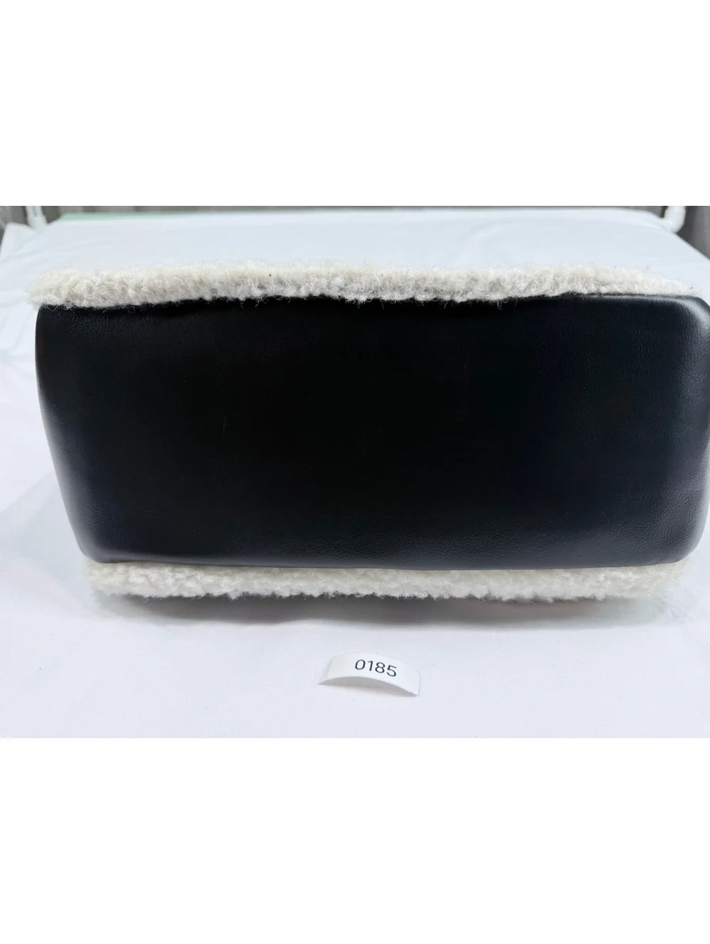 Bearpaw Black and White Sherpa Faux Leather Backpack